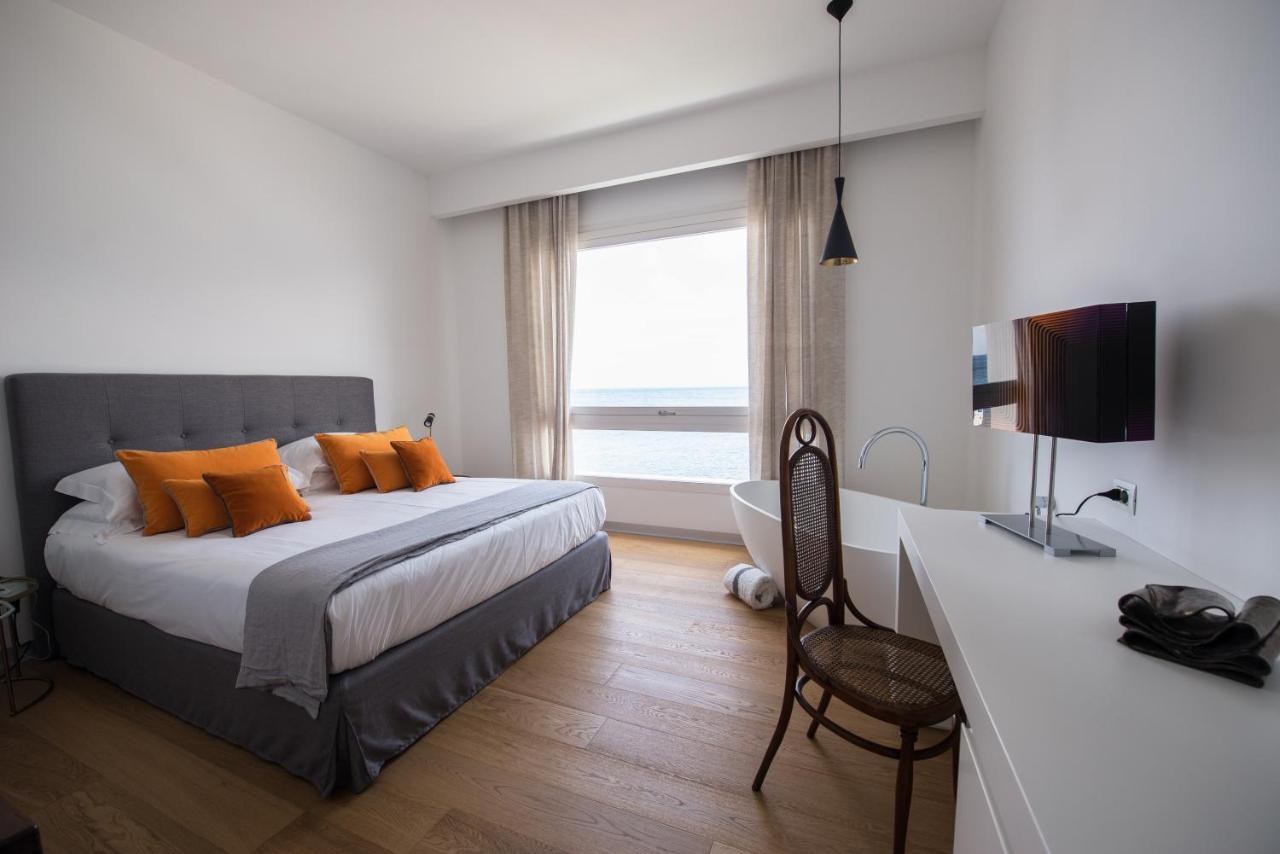 Unico Boutique Hotel D'Arte มอนเดลโล ภายนอก รูปภาพ