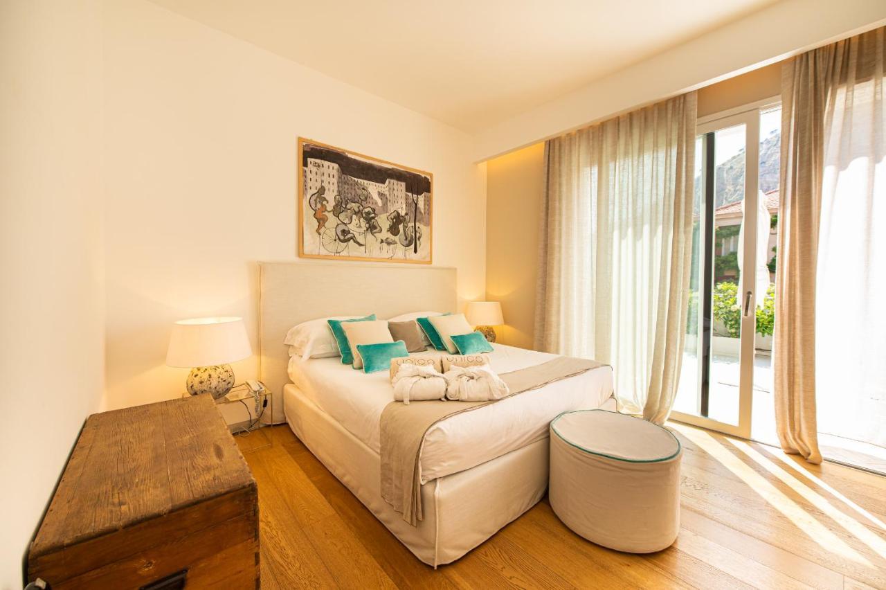 Unico Boutique Hotel D'Arte มอนเดลโล ภายนอก รูปภาพ