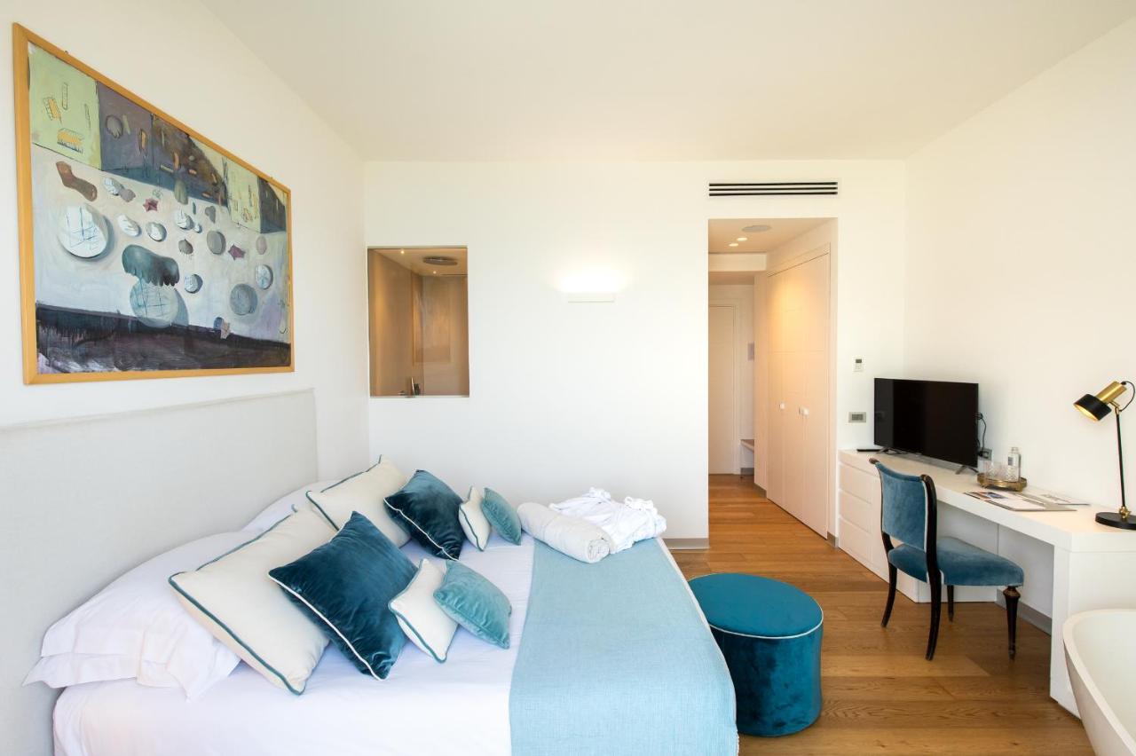 Unico Boutique Hotel D'Arte มอนเดลโล ภายนอก รูปภาพ
