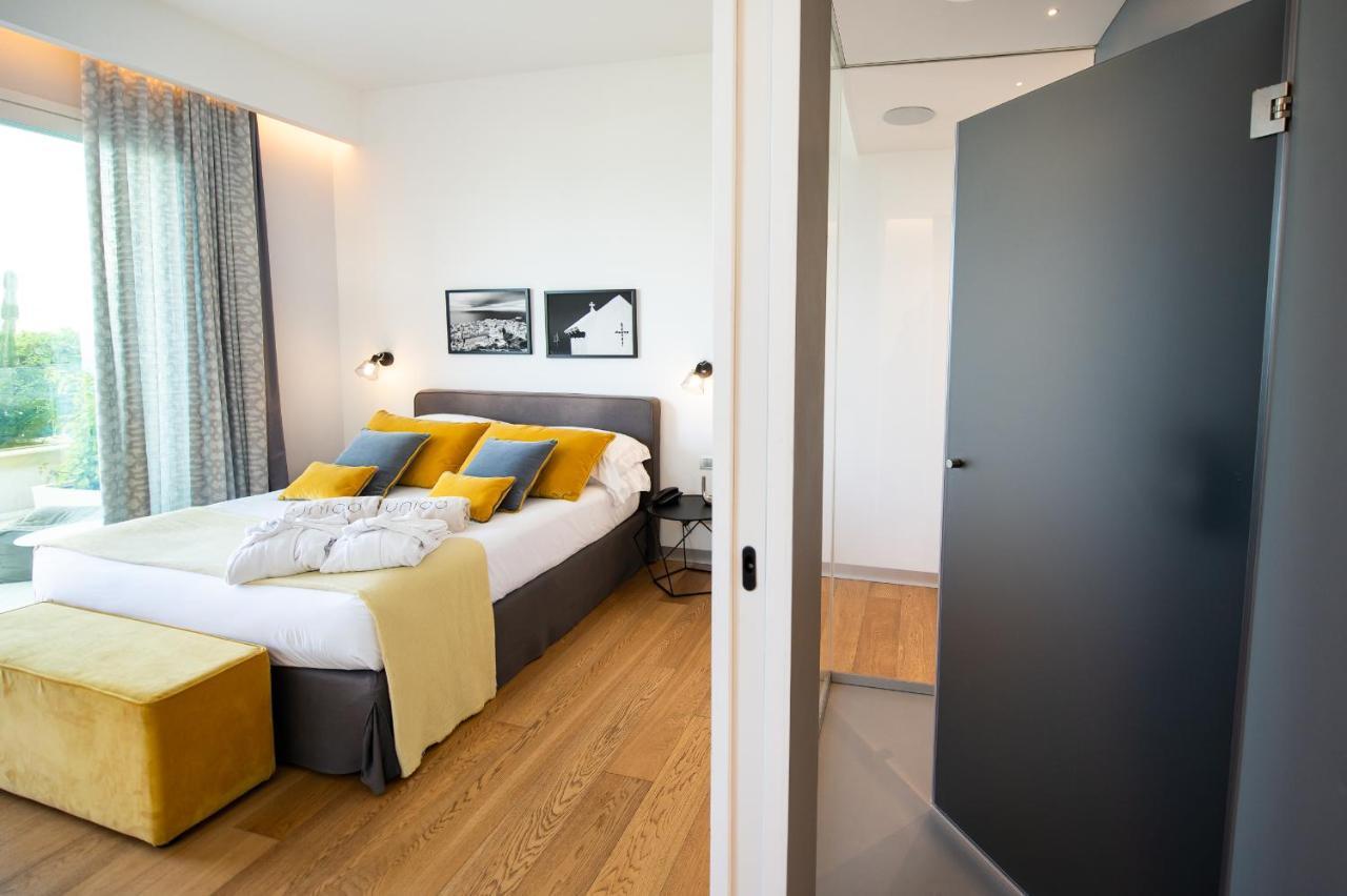 Unico Boutique Hotel D'Arte มอนเดลโล ภายนอก รูปภาพ