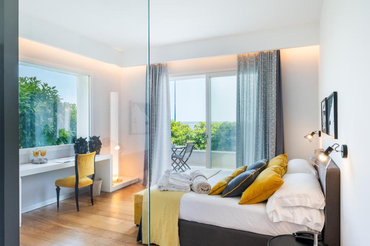 Unico Boutique Hotel D'Arte มอนเดลโล ภายนอก รูปภาพ